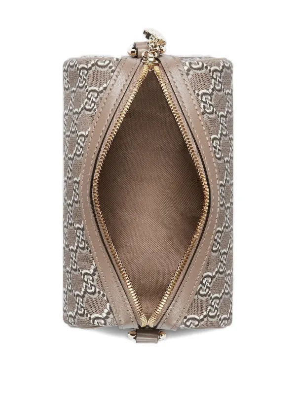 Gucci
GG Supreme Canvas cylindrical shoulder bag