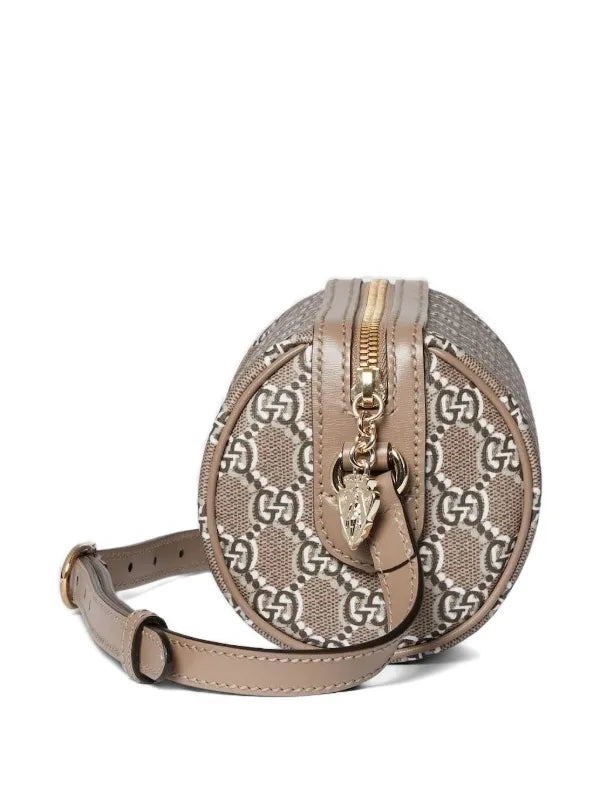 Gucci
GG Supreme Canvas cylindrical shoulder bag
