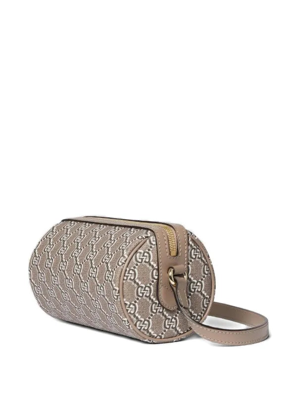 Gucci
GG Supreme Canvas cylindrical shoulder bag